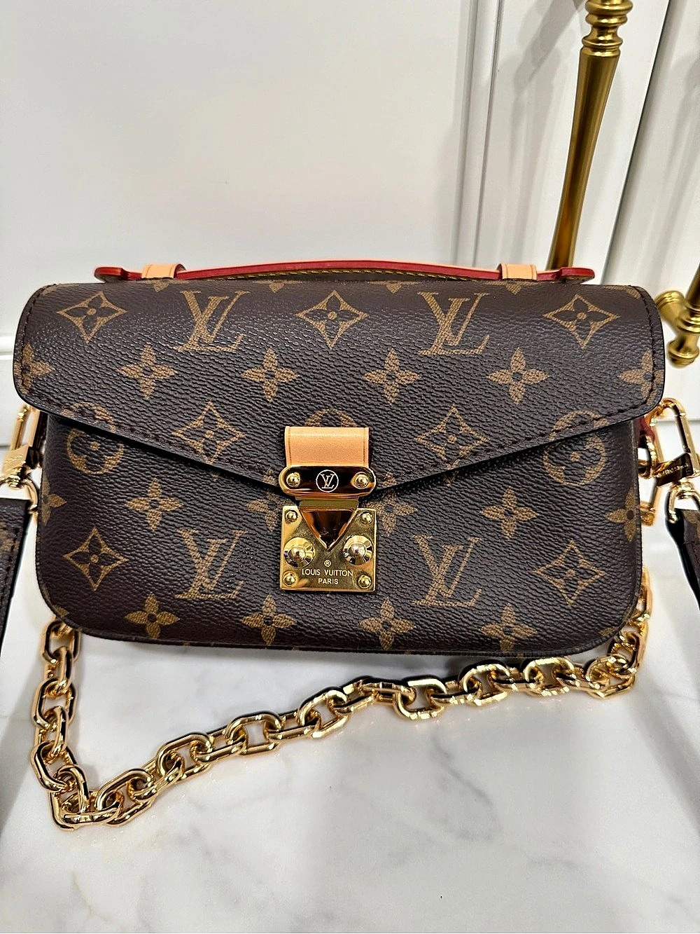Pochette Métis East West Monogram Crossbody Brown